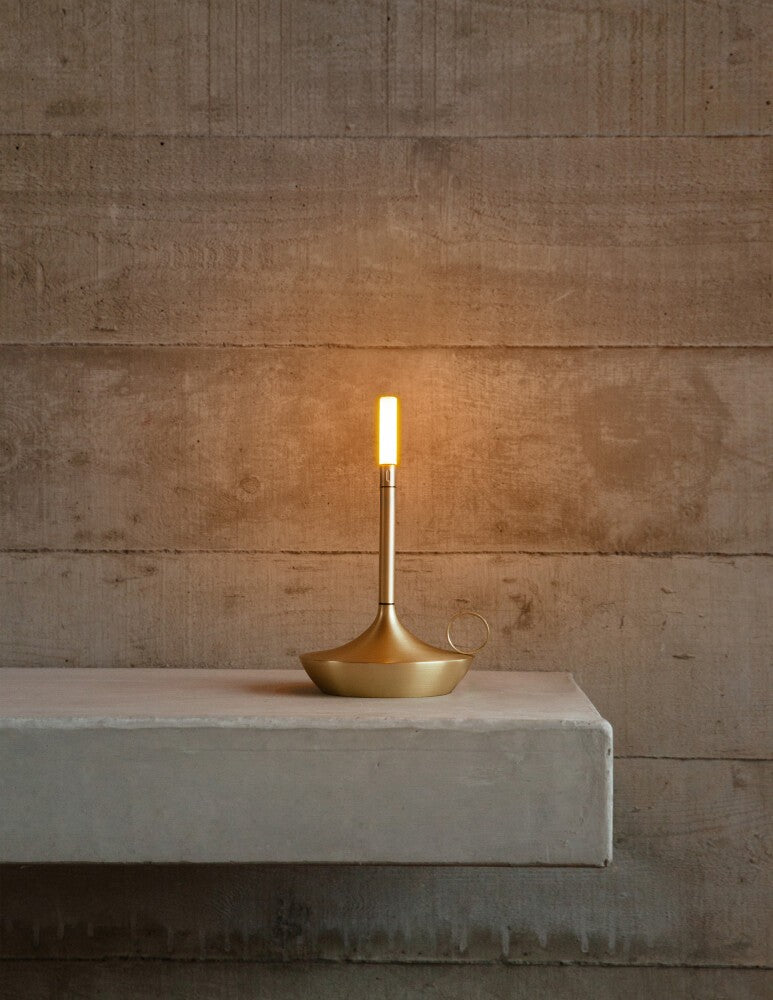 Table lamp placed on a low wall
