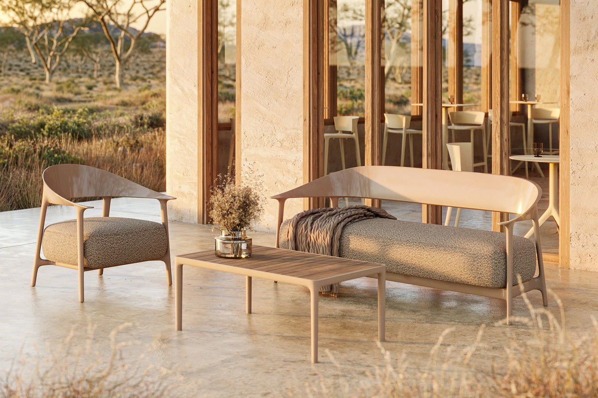 sofa, chairs, and table for indoor and outdoor use by Africa Vondom on a hotel terrace