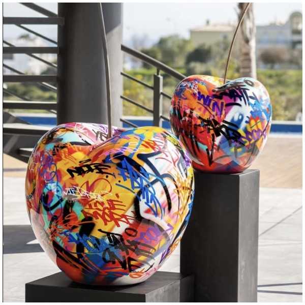 cherry sculpture with graffiti by bull & stein