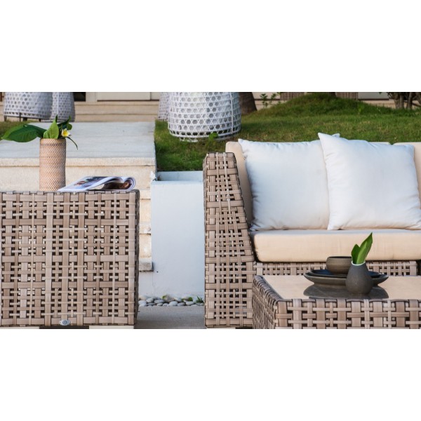 a wicker furniture set on a patio