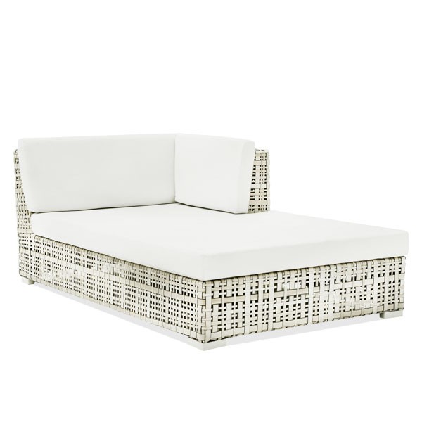 a white wicker chaise lounge