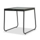 a black side table with a glass top