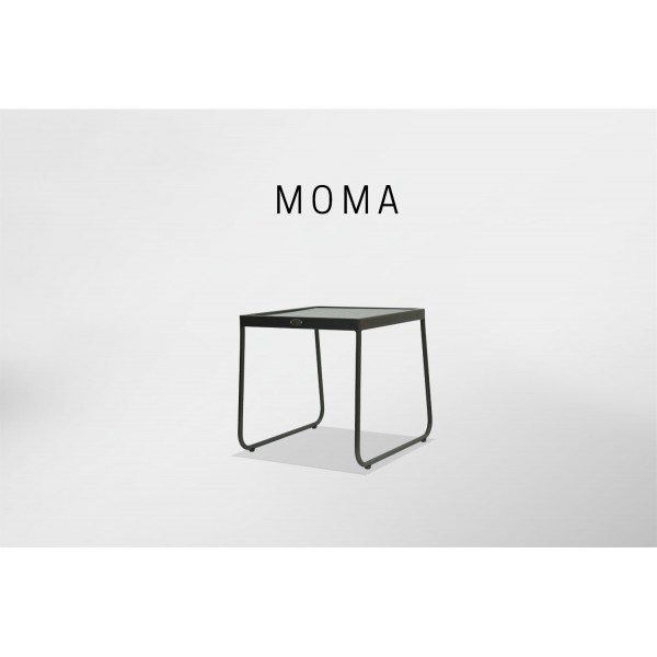 a black side table with a glass top
