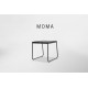 a black side table with a glass top