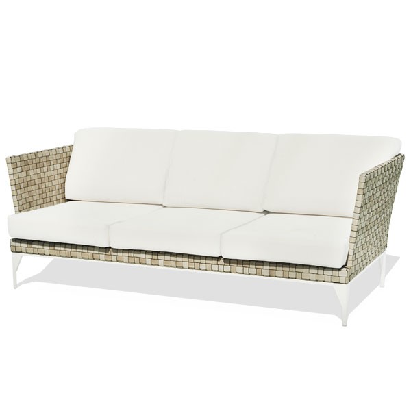 an outdoor sofa with white cushions