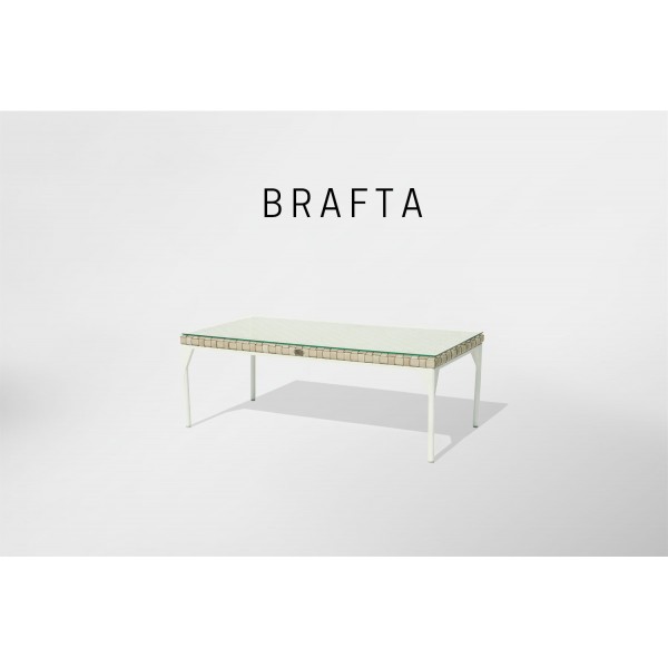 a white coffee table with a glass top