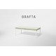 a white coffee table with a glass top