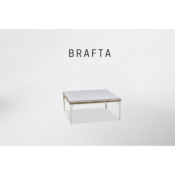 a white coffee table with a square top