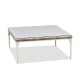 a white coffee table with a square top
