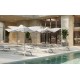 chaises longues africa vondom au bord de piscine