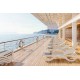 Vondom Love sun lounger on a terrace with sea view