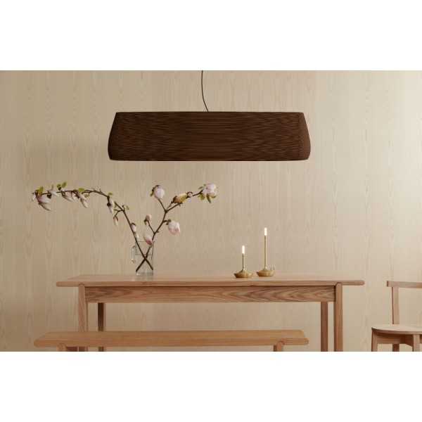 Wick S Pro and Wick Pro table lamps placed on a wooden table