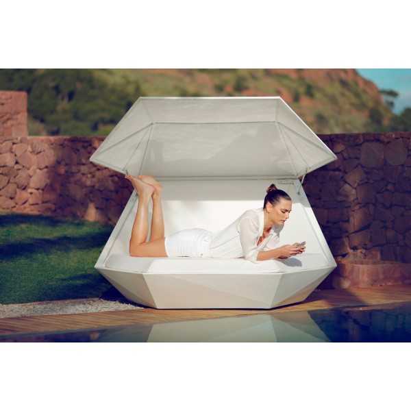 Relaxing on Oversized Lacquered Faz Daybed with Parasol by Vondom