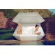 Relaxing on Oversized Lacquered Faz Daybed with Parasol by Vondom