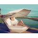 Sunbathing on a Faz Daybed with Sunshade System by Vondom