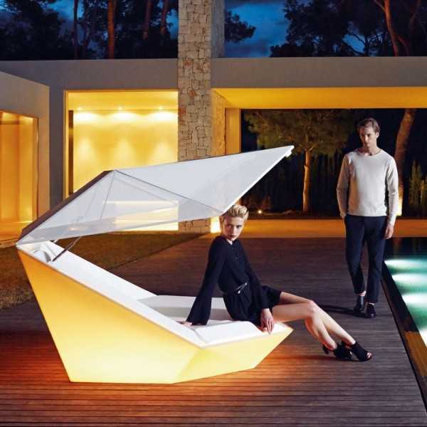 Giant RGB Lighting Faz Daybed with Parasol on a Hotel Poolside