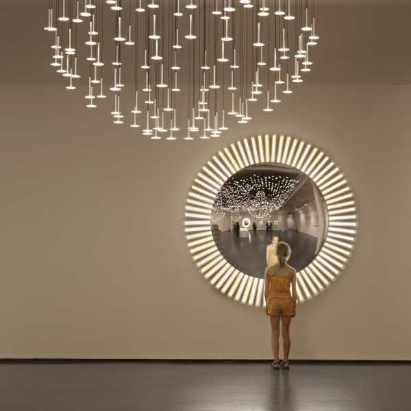 LUCKY EYE L Wall Lamp with starburst OLED lights and Mirror