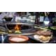 Realisation de burgers sur la table haute exterieur Brasero barbecue au bois FUSION HIGH de VULX