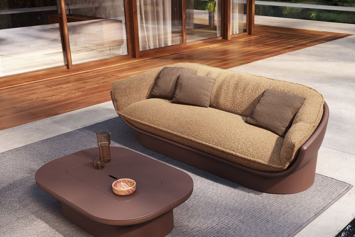 Luna Vondom indoor outdoor 3-seater sofa next to a coffee table on a terrace