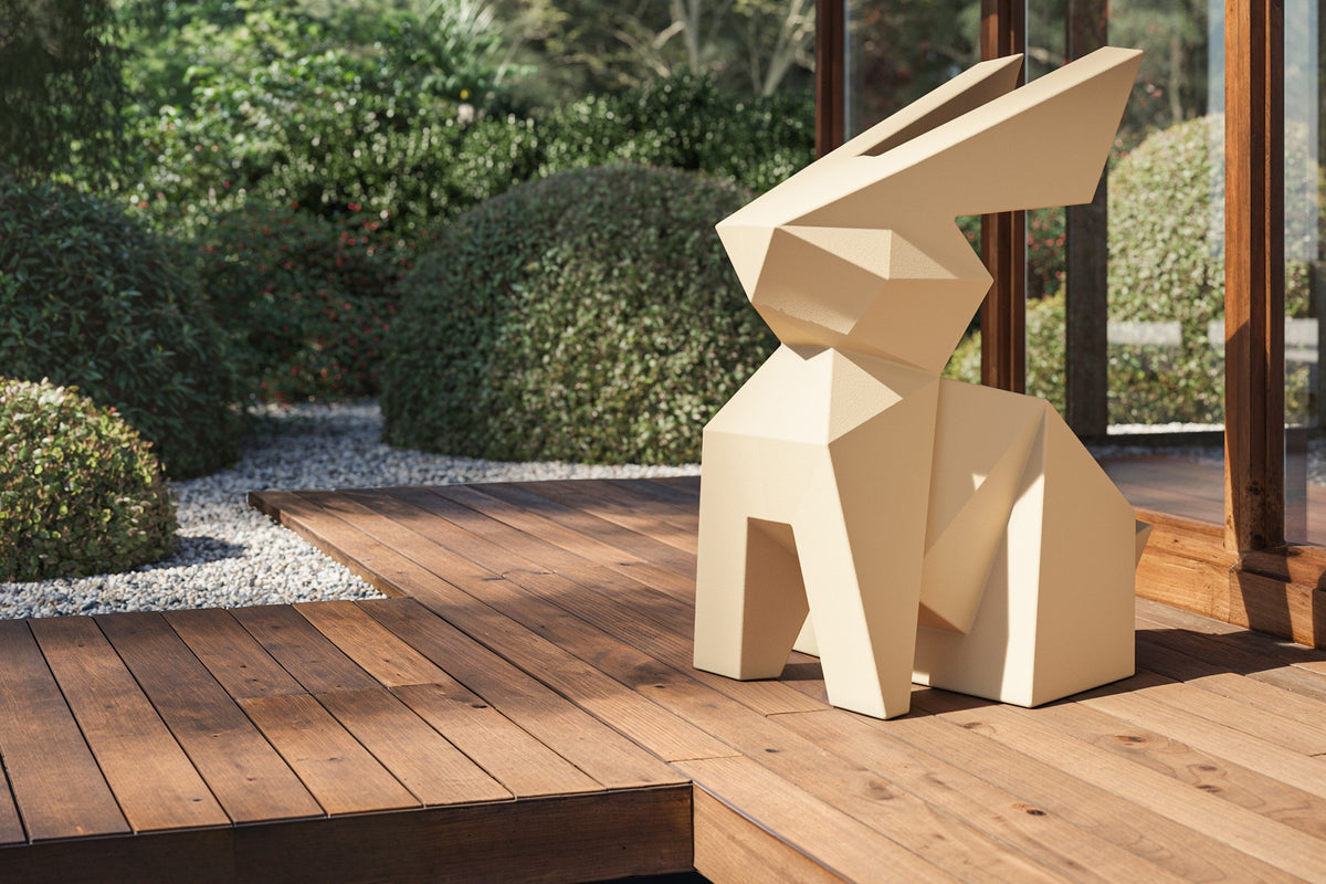 Terrace with a large Usagi Origami rabbit garden statue by Vondom